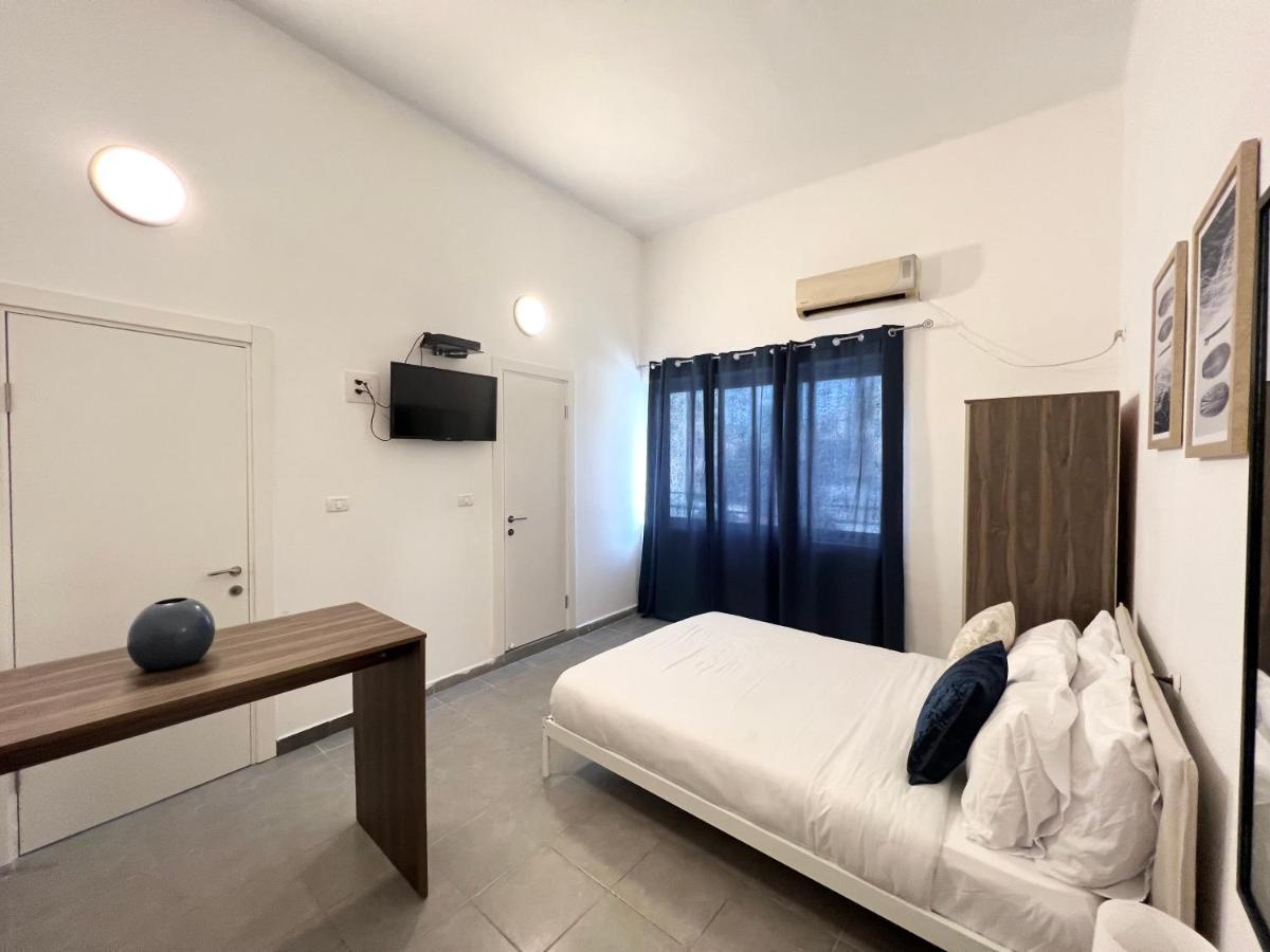 Aspentlv - Hacarmel Market Apartments & Studios Тель-Авив Экстерьер фото