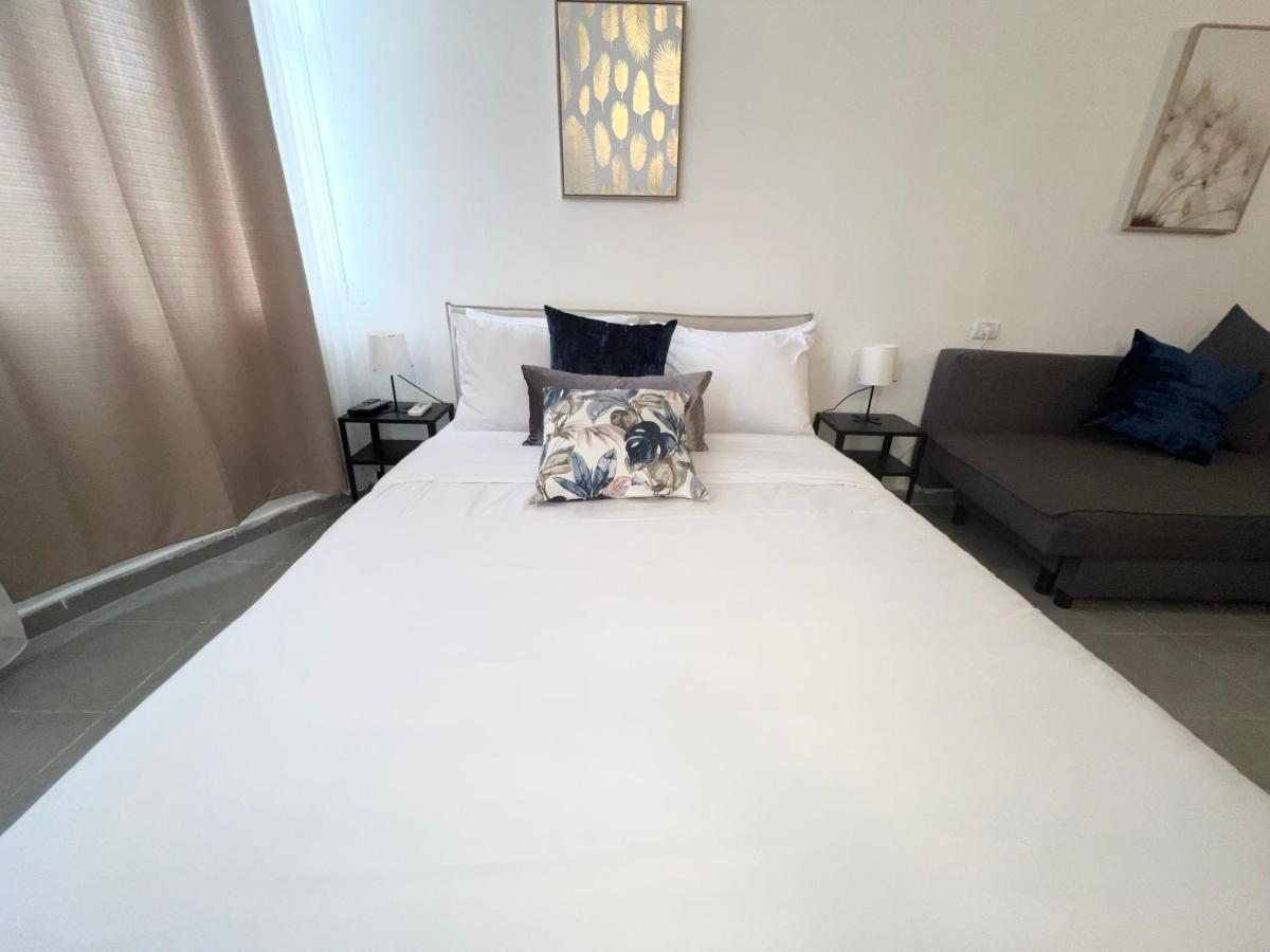 Aspentlv - Hacarmel Market Apartments & Studios Тель-Авив Экстерьер фото