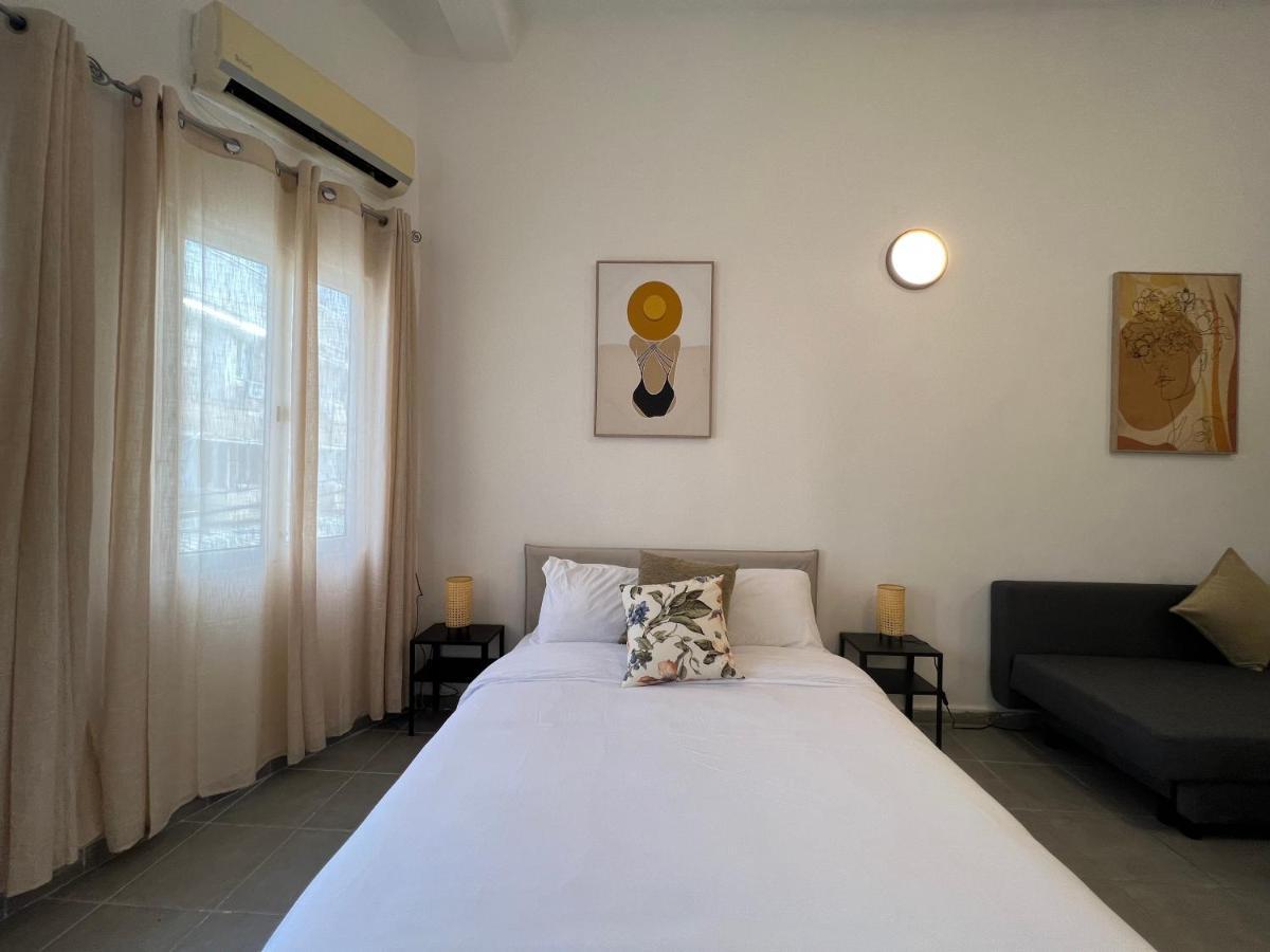 Aspentlv - Hacarmel Market Apartments & Studios Тель-Авив Экстерьер фото