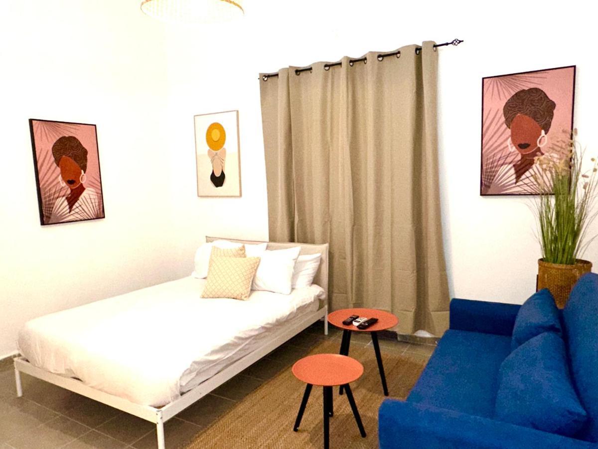 Aspentlv - Hacarmel Market Apartments & Studios Тель-Авив Экстерьер фото