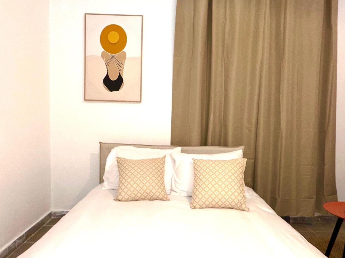 Aspentlv - Hacarmel Market Apartments & Studios Тель-Авив Экстерьер фото