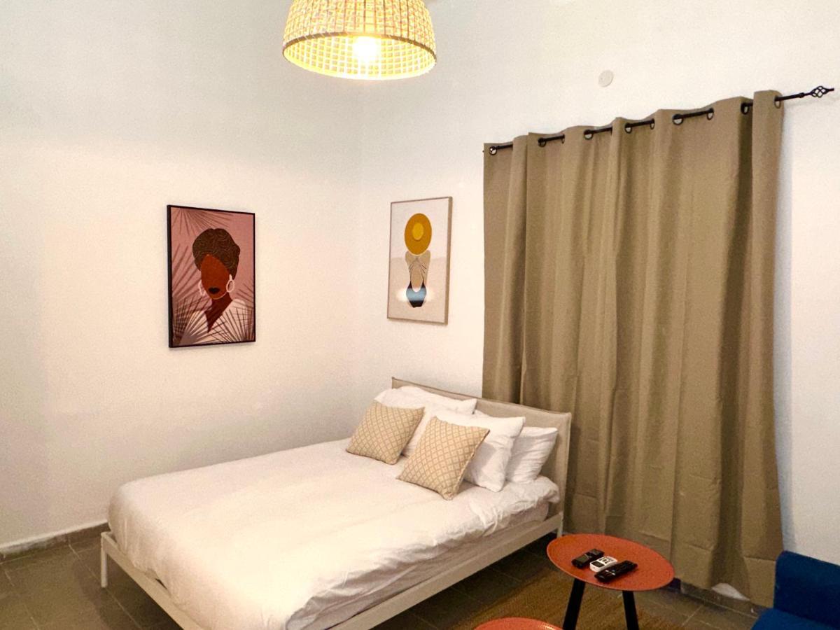 Aspentlv - Hacarmel Market Apartments & Studios Тель-Авив Экстерьер фото